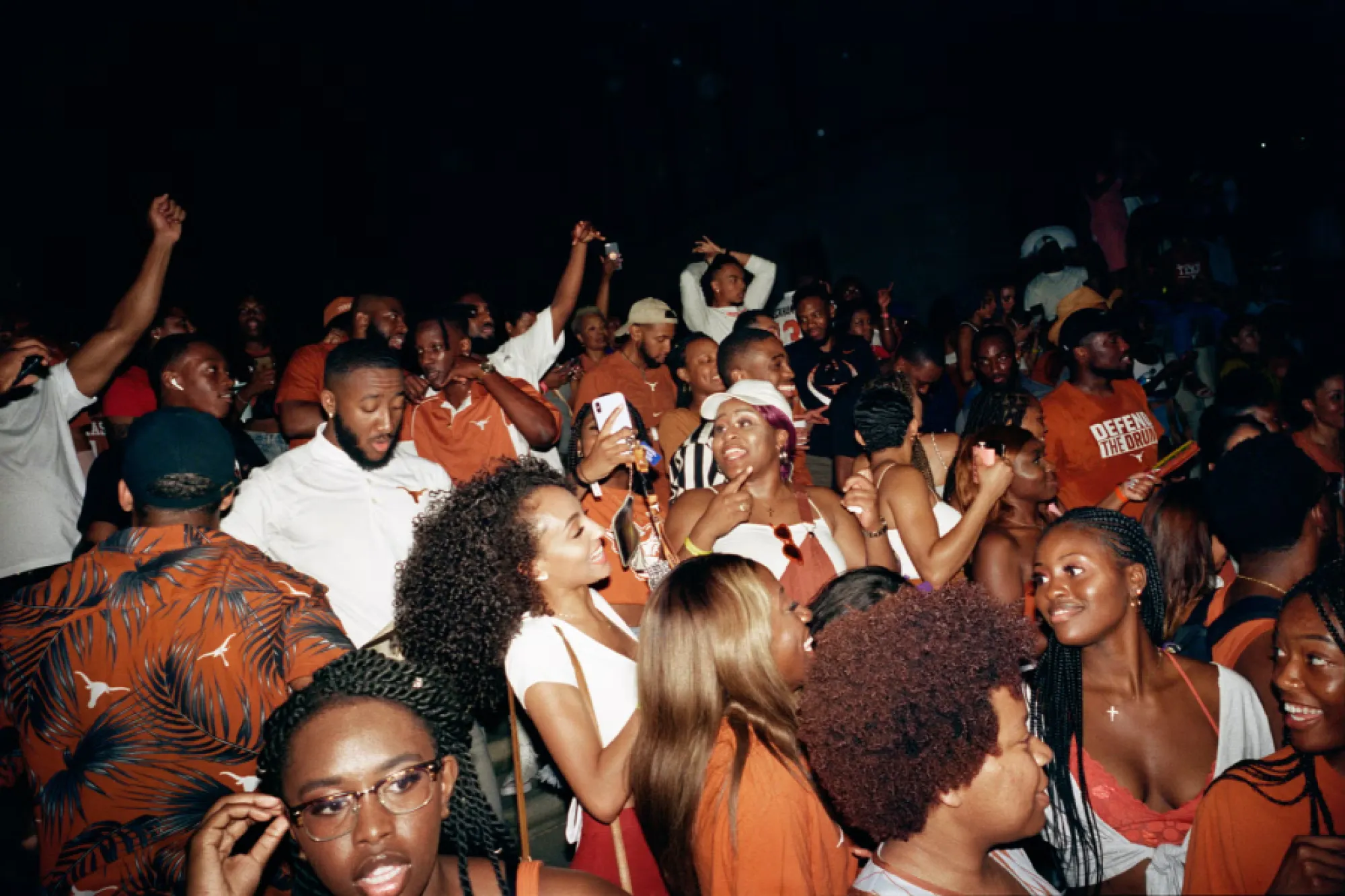 A large group of students dancing and having fun