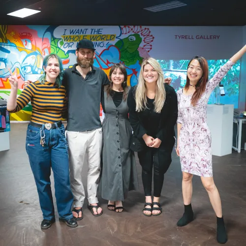 The team behind Entangled Intelligences smiling in Tyrell Gallery