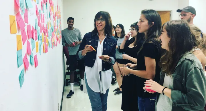 Doreen Lorenzo works with students in a class offered by the Center for integrated Design. Photo by Michelle Harris.