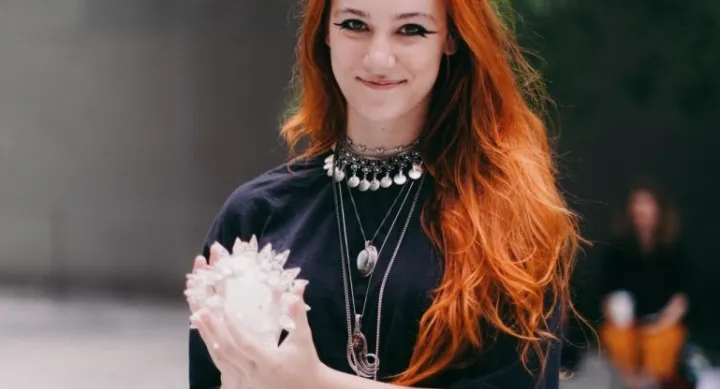 Anya Koehne holding an abstract object